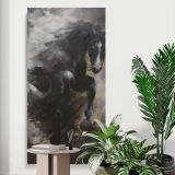 Black Horse in Storm Clouds canvas print displayed in a modern interior