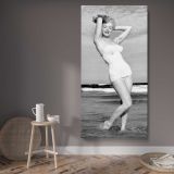 Marilyn Monroe in a White Swimsuit canvas wall art displayed in a contemporary room