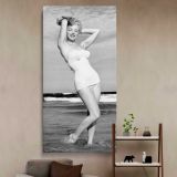 Marilyn Monroe in a White Swimsuit canvas wall art in a styled interior