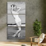 Marilyn Monroe in a White Swimsuit three panel canvas print in a contemporary interior