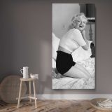 Marilyn Monroe Relaxing in Bed canvas wall art displayed in a contemporary room