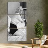 Marilyn Monroe Relaxing in Bed three panel canvas print in a contemporary interior