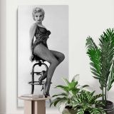 Marilyn Monroe Seated Bus Stop Portrait canvas print displayed in a modern interior