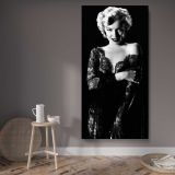 Marilyn Monroe in a Black Evening Dress canvas wall art displayed in a contemporary room