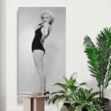 Marilyn Monroe Black Swimsuit Portrait canvas print displayed in a modern interior