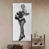 Marilyn Monroe Playing Guitar canvas wall art in a styled interior