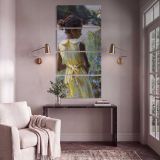 Woman in a Yellow Dress by a Garden Pond by Daniel Gerhartz canvas print shown in a styled interior