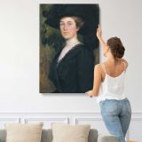 Woman in a Black Hat by Lilla Cabot Perry canvas print, displayed on a wall