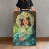 Little Girl in a Blue Coat and Floral Hat by Mary Cassatt canvas print, held for scale