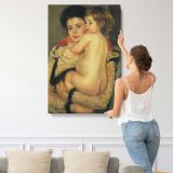 Mother Embracing a Child by Mary Cassatt canvas print, displayed on a wall