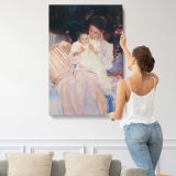 Mother Holding a Baby in a Pink Dress canvas print, displayed on a wall