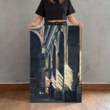 Sunlight on a City Building canvas print, held for scale