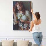 Woman Holding a White Rose by Daniel Gerhartz canvas print, displayed on a wall