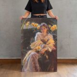 Seated Woman with Yellow Flowers by Daniel Gerhartz canvas print, held for scale
