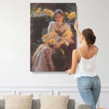 Seated Woman with Yellow Flowers by Daniel Gerhartz canvas print, displayed on a wall