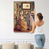 A Femme a la poupee japonaise by Alfred Stevens canvas print, displayed on a wall