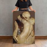 The Kiss detail from behind by Auguste Rodin canvas print, held for scale
