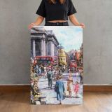 Trafalgar Square London canvas print, held for scale