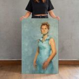 Laura in Blue by Aaron Coberly canvas print, held for scale