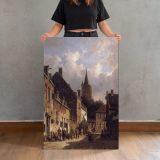A Dutch Street Scene by Adrianus Eversen canvas print, held for scale