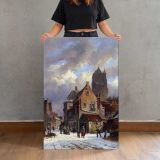 Figures In A Snowy Village Street by Adrianus Eversen canvas print, held for scale