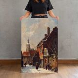 Figures In The Streets Of A Dutch Town In Winter by Adrianus Eversen canvas print, held for scale