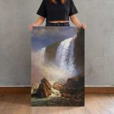 Falls of Niagara from Below by Albert Bierstadt canvas print, held for scale