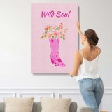 Wild Soul Pink Cowboy Boot with Flowers canvas print, displayed on a wall