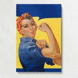 Woman Flexing in Blue Workwear canvas print, front view