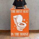 The Best Seat in the House Orange Bathroom Quote canvas print, held for scale