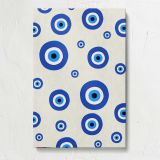 Blue Evil Eye Pattern on Cream canvas print, front view