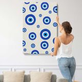 Blue Evil Eye Pattern on Cream canvas print, displayed on a wall