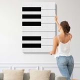 Minimal Black and White Piano Keys canvas print, displayed on a wall