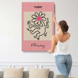 Dancing Flower Figure on Pink canvas print, displayed on a wall