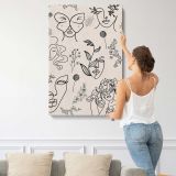 Botanical Faces and Butterflies Line Art canvas print, displayed on a wall
