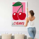 Red Cherries on Pink canvas print, displayed on a wall