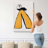 Woman in Wide Yellow Trousers canvas print, displayed on a wall