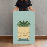 Succulent in a Woven Planter canvas print, held for scale