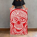 Red and Cream Sugar Skull canvas print, held for scale