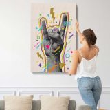 Rock Hand Gesture Colourful Collage canvas print, displayed on a wall