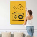 Love You Yellow Camera Illustration canvas print, displayed on a wall