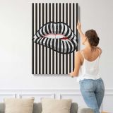 Striped Lips Black and White Optical Art canvas print, displayed on a wall