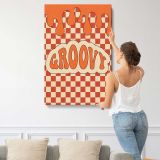 Groovy Orange Checkerboard Typography canvas print, displayed on a wall