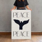 Peace Dove Black Silhouette canvas print, held for scale