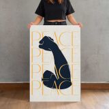 Black Cat with Gold Peace Typography canvas print, held for scale