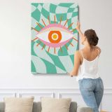 Pink Eye on Green Checkerboard canvas print, displayed on a wall