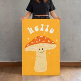 Hello Smiling Mushroom on Orange canvas print, held for scale