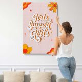 Girls Support Girls Floral Typography canvas print, displayed on a wall