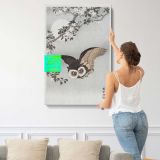 Scops Owl with Cherry Blossoms and Moon by Ohara Koson canvas print, displayed on a wall