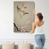 Sparrows and Plum Blossoms by Ohara Koson canvas print, displayed on a wall